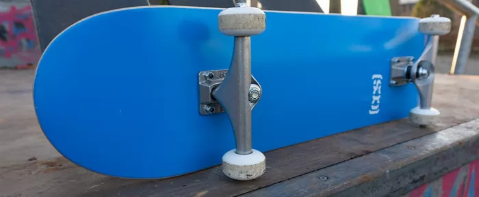 A CCS complete skateboard in a park setting, demonstrating its usability