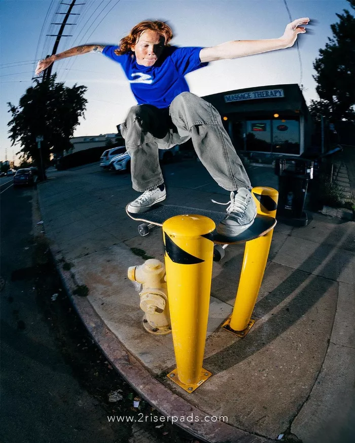 A close-up of 2 Riser Pads on a skateboard