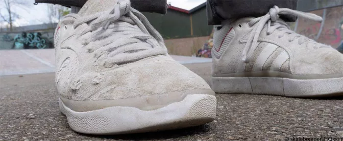 A close up of the toe of an Adidas 3st skate shoe, emphasizing the high-quality suede