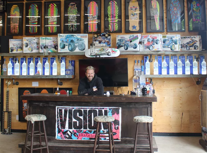 A close up of vintage skateboard decks on a wall