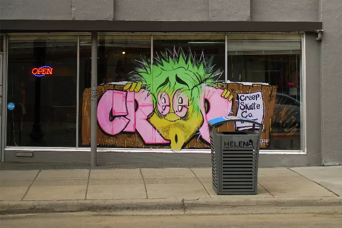 A close-up shot of skateboards and other items at Creep Skateshop