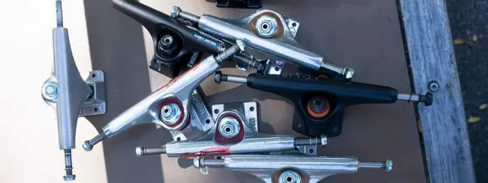 A collection of various skateboard trucks