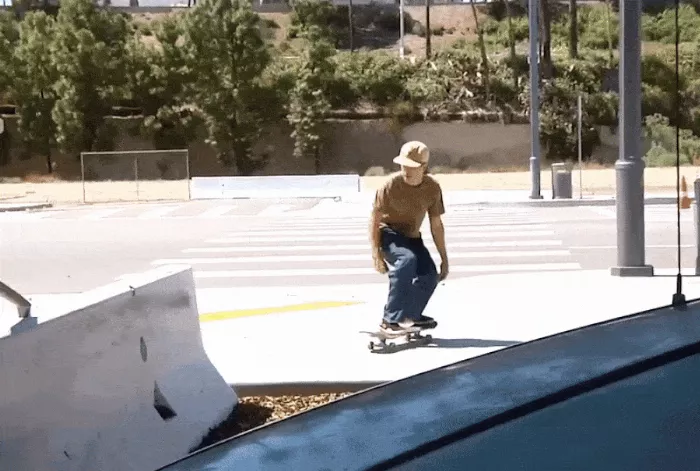 A GIF of Aidan Campbell performing a skateboard trick