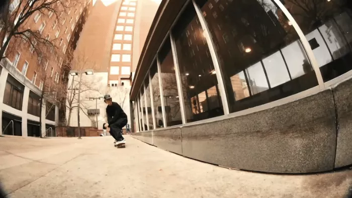 A GIF of skateboarding footage in an urban setting