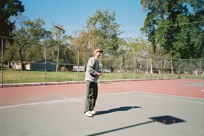 A group of skateboarders casually hanging out