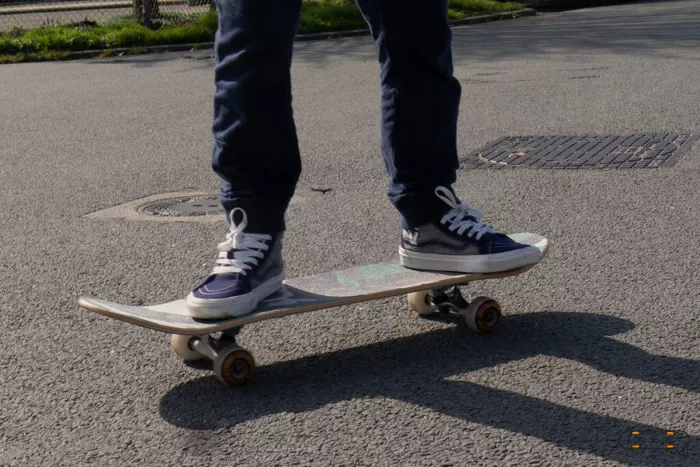 A longboarder demonstrating a goofy stance with right foot forward