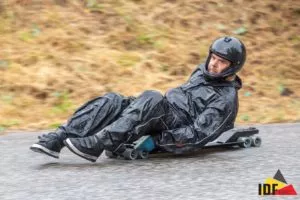 A luge rider wearing a Predator full-face helmet