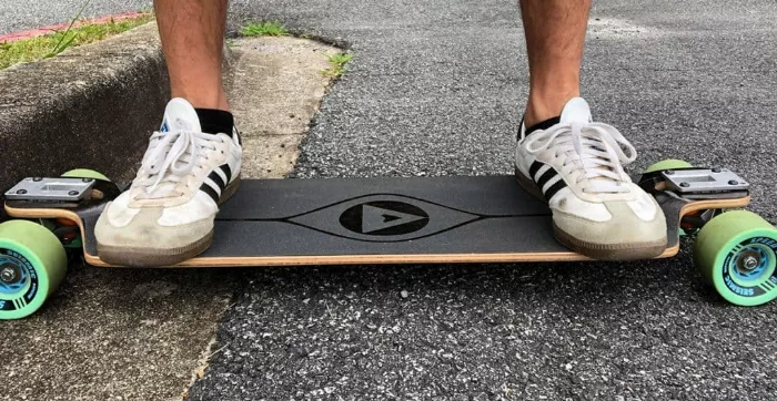 A Pantheon Pranayama longboard, showing its unique shape and design.