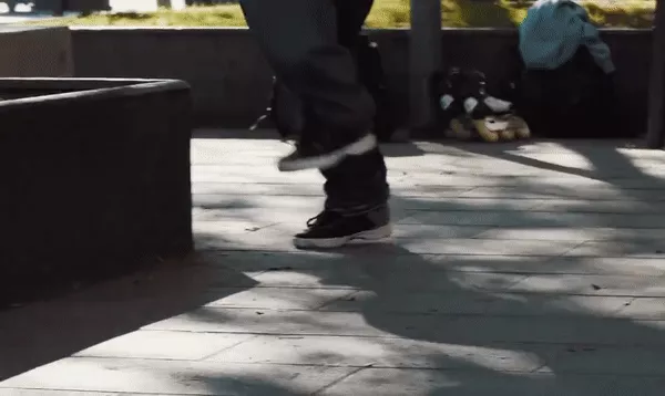 A person performing a grind with Epic Grindshoes