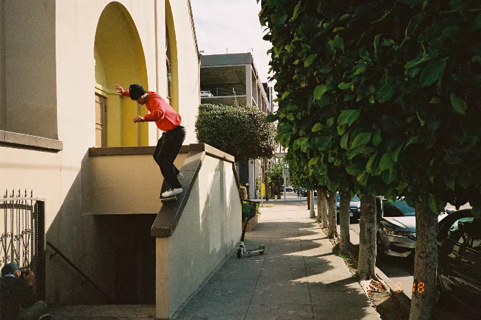 A person standing in front of a building