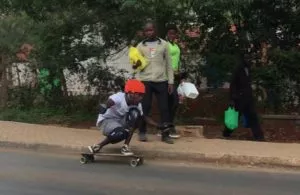 a person with a disapproving look, expressing the lack of mainstream respect for downhill skateboarding