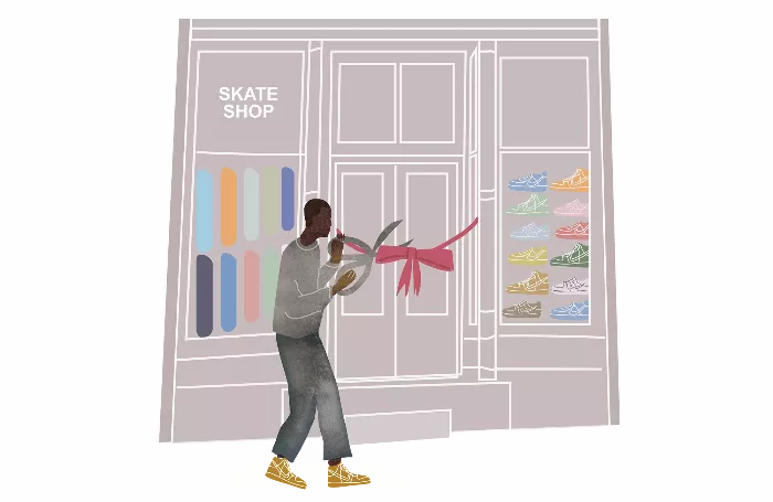 A photo of a skate shop employee assisting a customer