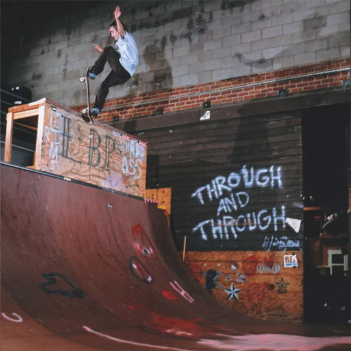 A photo of Gordon Eckler skateboarding at Jims Ramp.