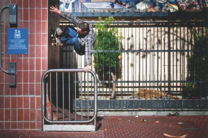 A photo of Gordon Eckler with Bart Banks in what looks like a skatepark.