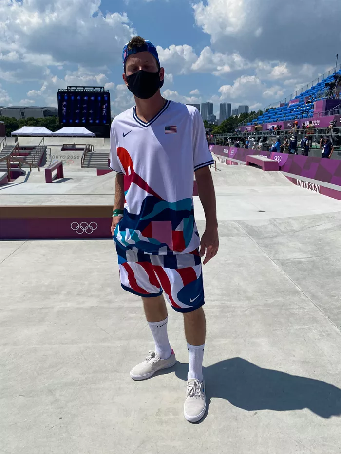 A photo of Jake Ilardi wearing the USA uniform at the Tokyo Olympics, highlighting the design.