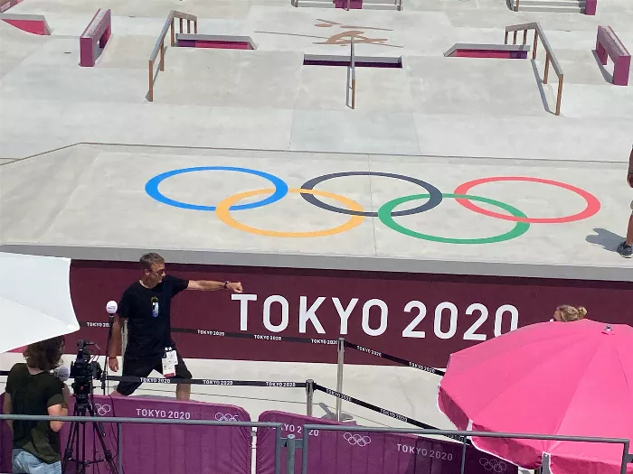 A photo of Tony Hawk at the Tokyo Olympics, highlighting his passion for skateboarding.