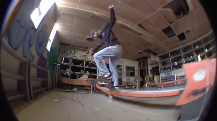 A skate session at the Old Homowack Lodge. Skaters are navigating the unique structures of the abandoned location