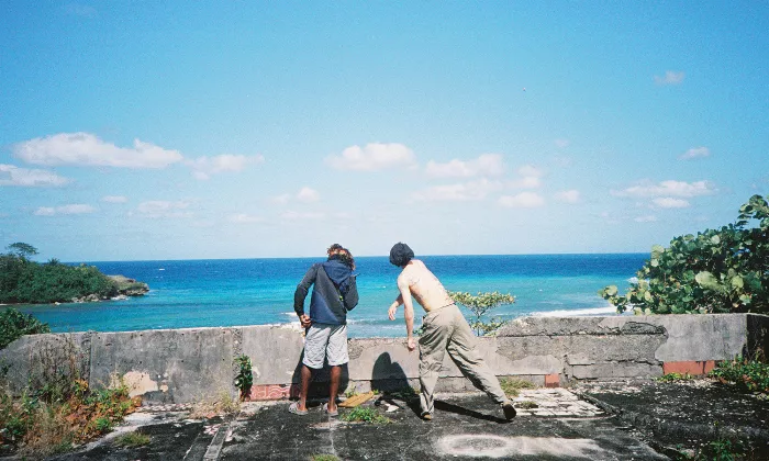 A skateboarder enjoying the vibrant atmosphere of Jamaica