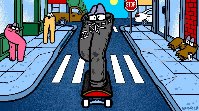 A skateboarder wearing baggy pants