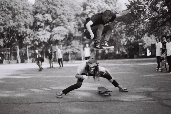 A skater doing a hippy jump at Tompkins Square Park