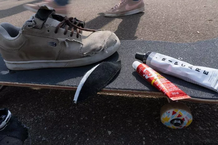 A visual representation of repairing skate shoes with various materials and methods