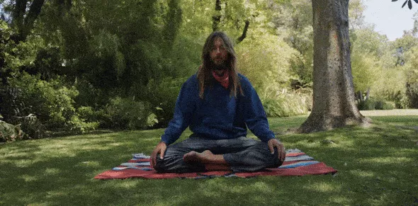 Alex Olson demonstrating a different Qigong movement