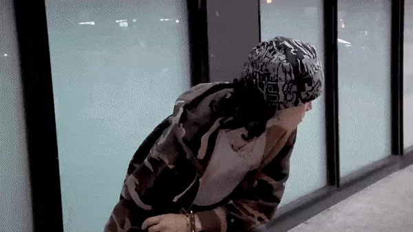 Animated gif of Efron Danzig skating and performing a trick.