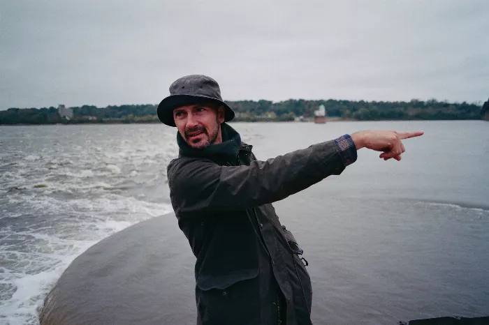 Another photo from Patrick O'Dell's &quot;Big River&quot; book, showing Heath Kirchart rowing a canoe.