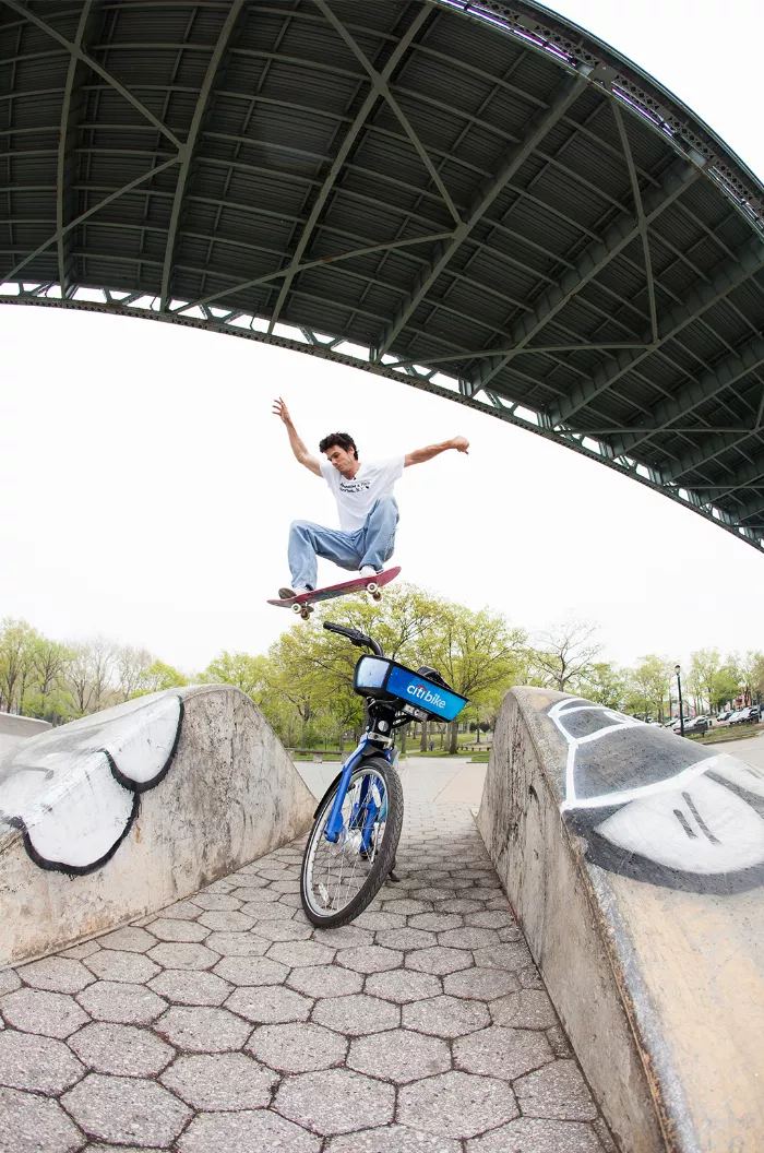 Another shot of Jerome Peel doing tricks on a Citi Bike, highlighting the difficulty of maneuvering such a heavy bike