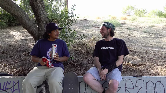 Another view of the El Sereno skate park, focusing on the interview setting and the casual atmosphere