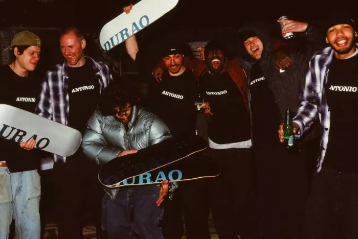 Antonio Durao and friends celebrating his pro board