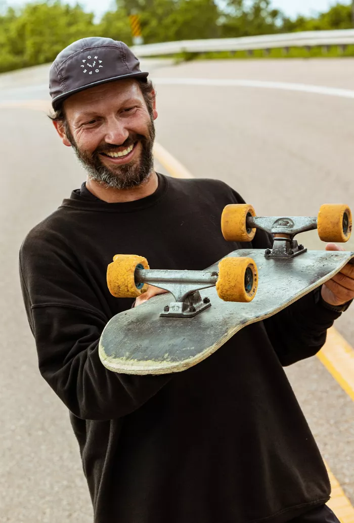 Chad Caruso performing a trick on his skateboard