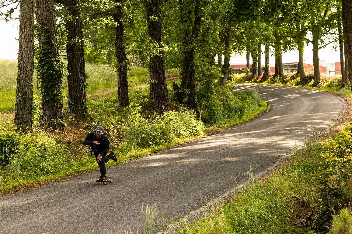 Chad Caruso skateboarding across America with a backpack