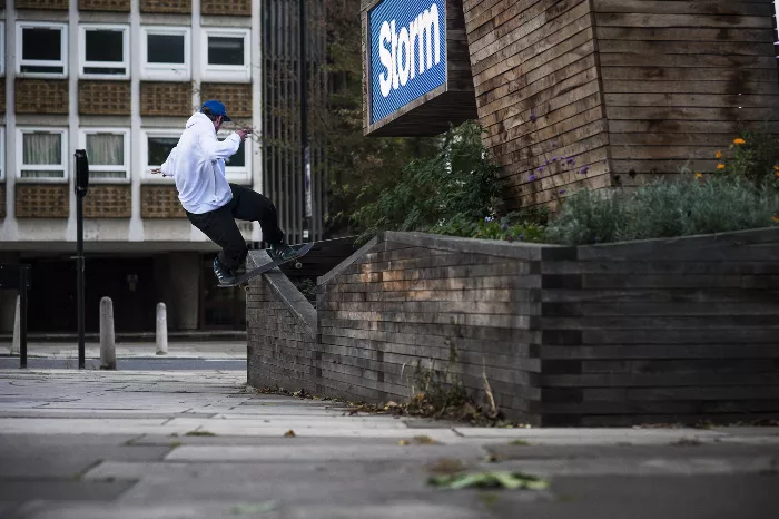 Chewy Cannon performing a frontside upslide in London