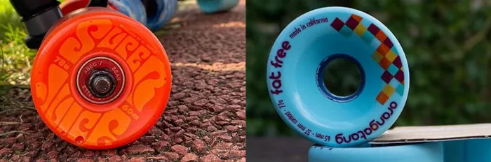 Close up of OJ and Orangatang cruiser wheels, highlighting their size and design.