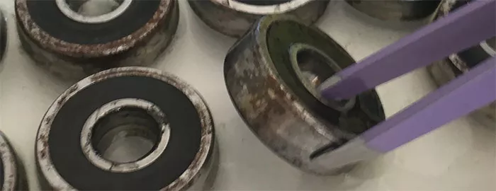 Close-up of old, rusty skateboard bearings