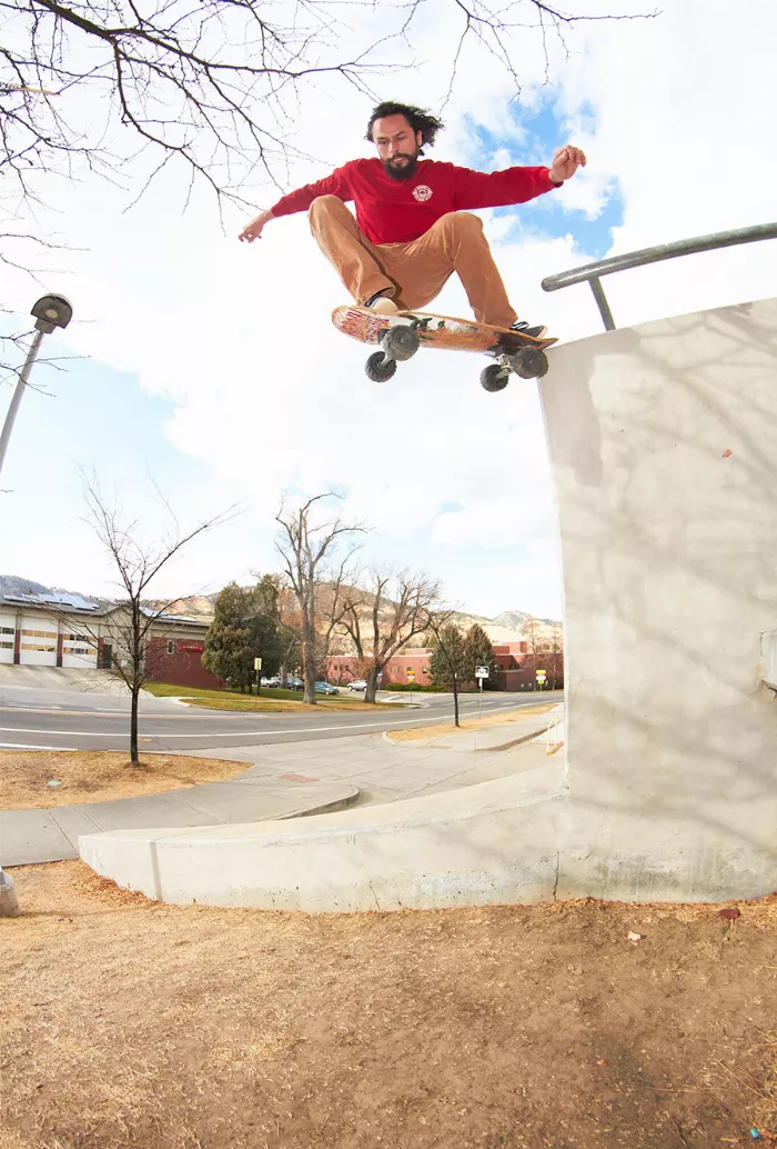 Donnie Mortensen performing a tail drop with his off-road skateboard