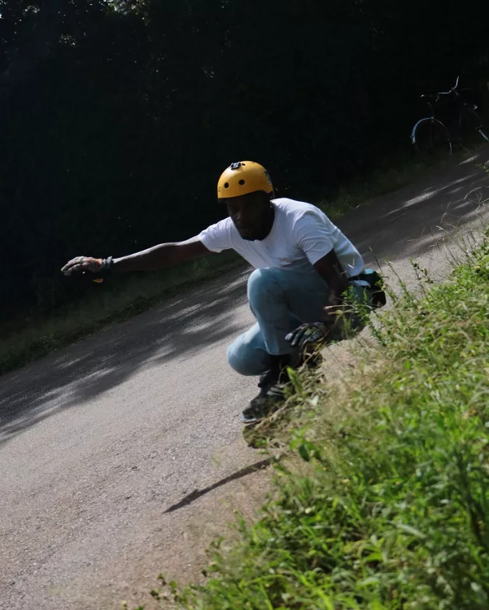 downhill skateboarding gripping a corner