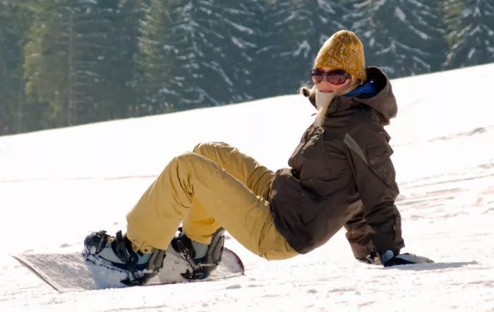 Female snowboarder boots