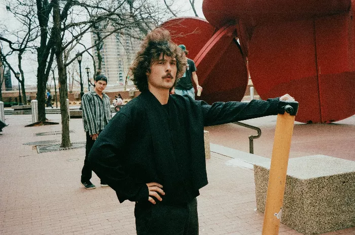 Henry Cabelus captured mid-air on a pogo stick at a skate spot in New York.