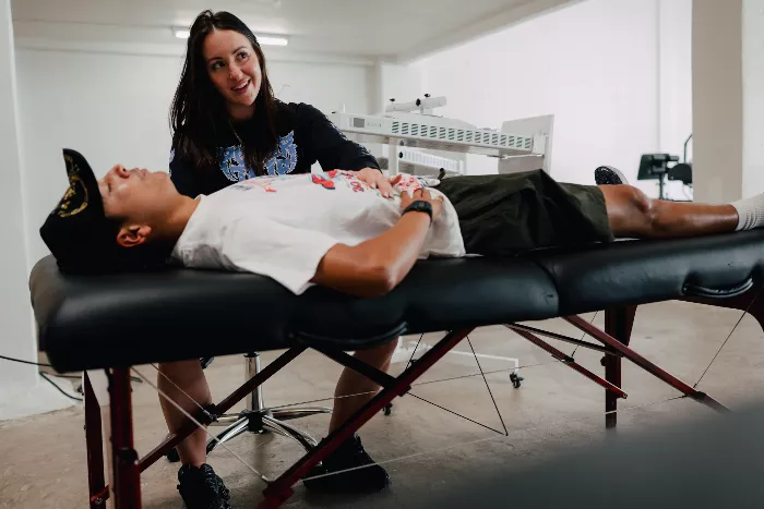 Jessika Alexander, a prominent athletic trainer in skateboarding, poses for a photo.