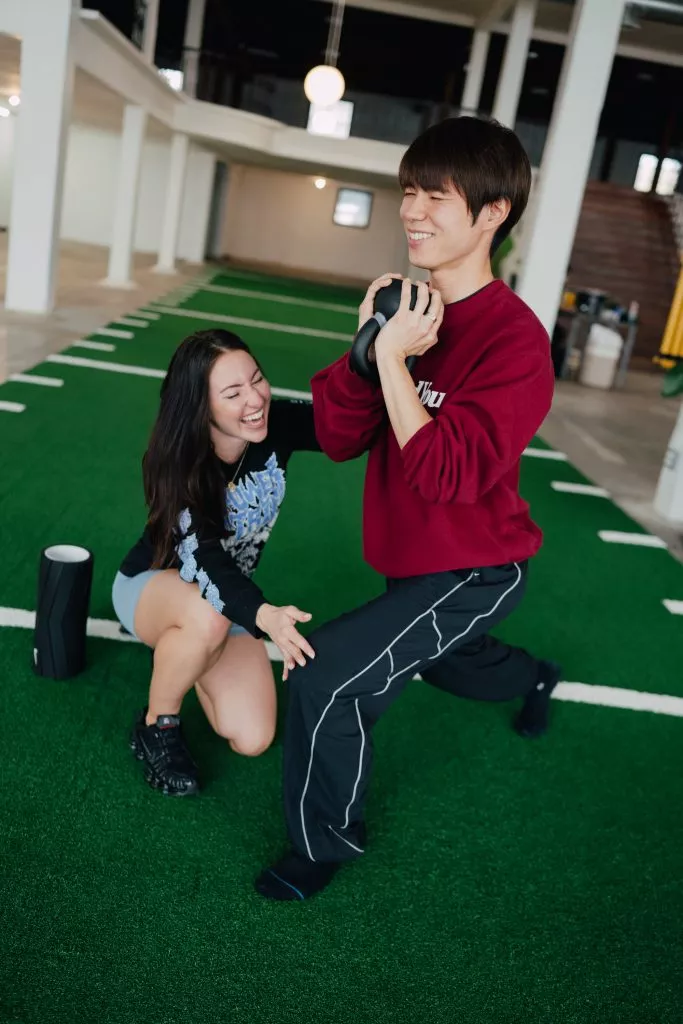 Jessika Alexander and Yuto Horigome, two figures in the skateboarding and training community, pose together.