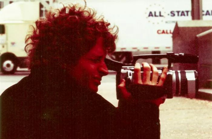 Jon Miner filming with a camera