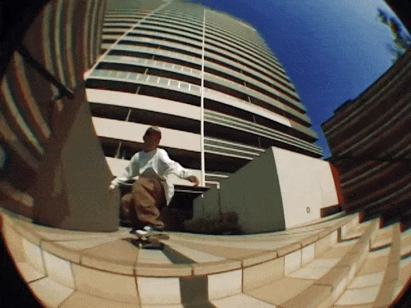 Junnosuke Hasegawa performing a back 270 lip trick on a handrail.