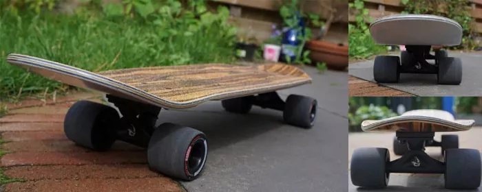 Landyachtz Dinghy cruiser board with natural wood deck, black trucks and red wheels