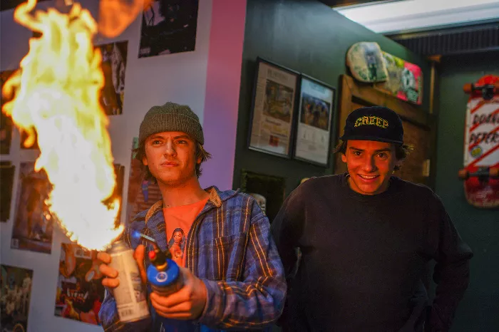 Levi Metz and Jake Orgeron, founders of Creep Skateshop, posing in their store