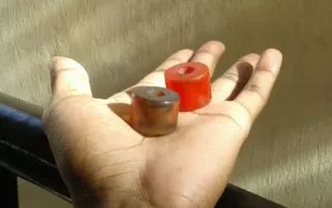 Longboard bushings come in different durometers and shapes, and affect how the truck leans and turns