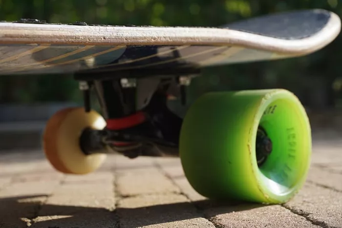 Longboard wheel attached to a skateboard