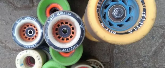 Longboard wheels are designed to handle various terrains, unlike skateboard wheels