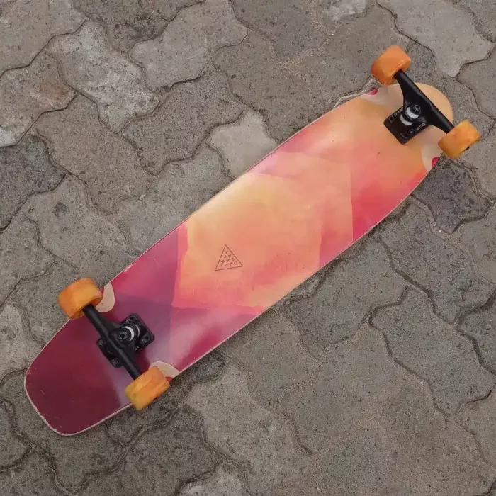 Longboard with a 24-inch wheelbase and TKP trucks